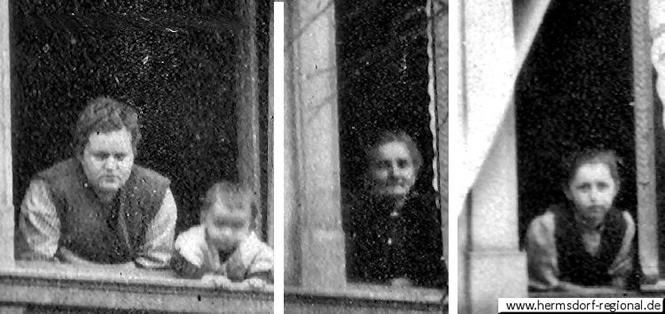 Ausschnitt von der Aufnahme oben links - Personen am Fenster des Hauses.